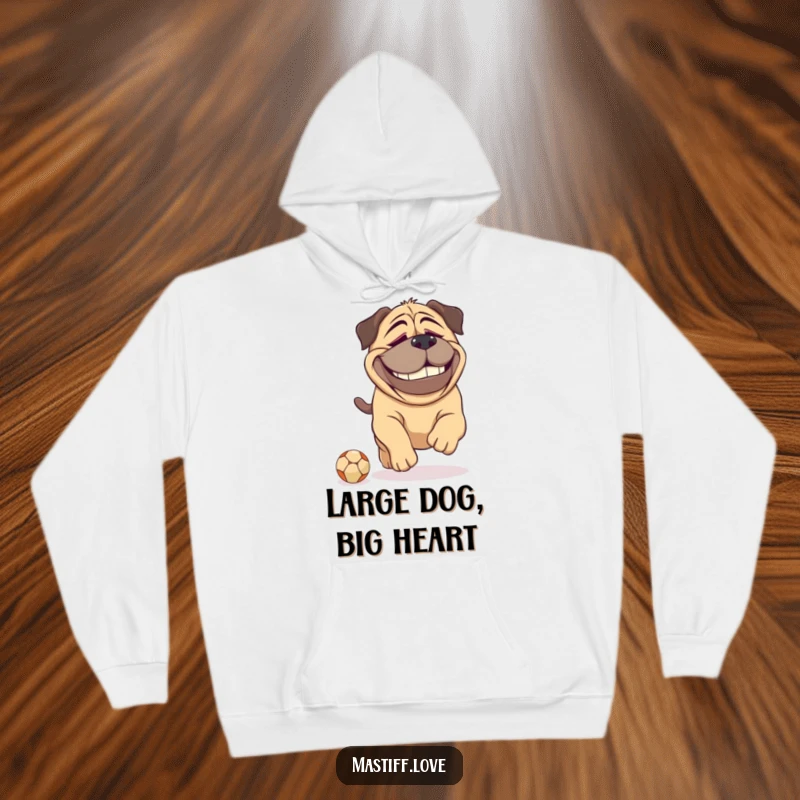Funny Mastiff hoodie depicting a massive dog with a dopey, happy grin, hilariously in pursuit of a minuscule ball, exuding playful energy.