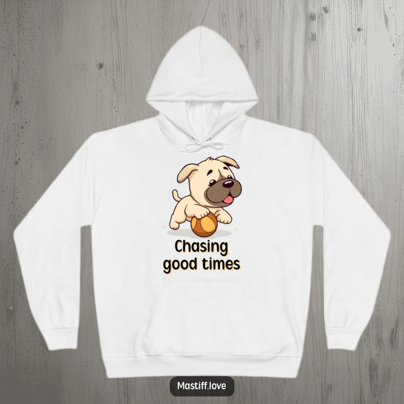 Funny cute mastiff puppy, playfully chasing a rolling ball, soft hoodie, perfect funny gift idea.