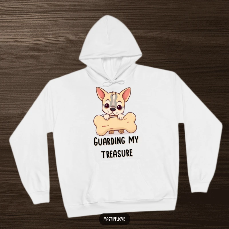 Funny hoodie depicting a small mastiff peeking from behind a giant bone, providing cozy comfort and comical vibes for a funny gift.