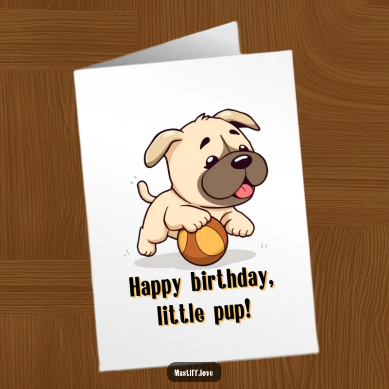 Cute Free Printable Birthday Card: A happy mastiff puppy excitedly chases a rolling ball, perfect for a fun birthday message. Download now!