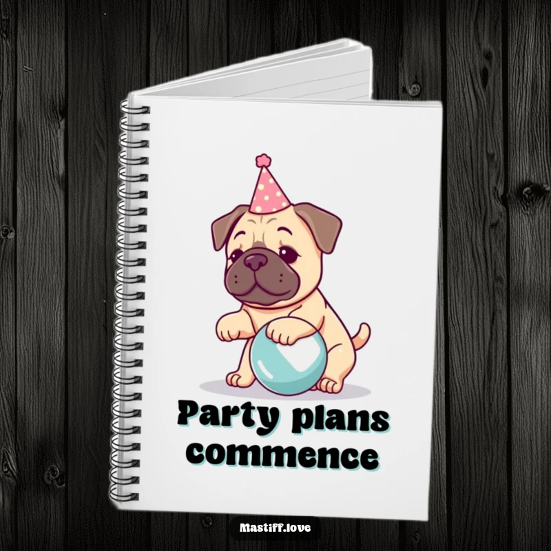 Funny kawaii mastiff notebook, featuring a cute dog in a party hat playing with a large ball, for notes and ideas.