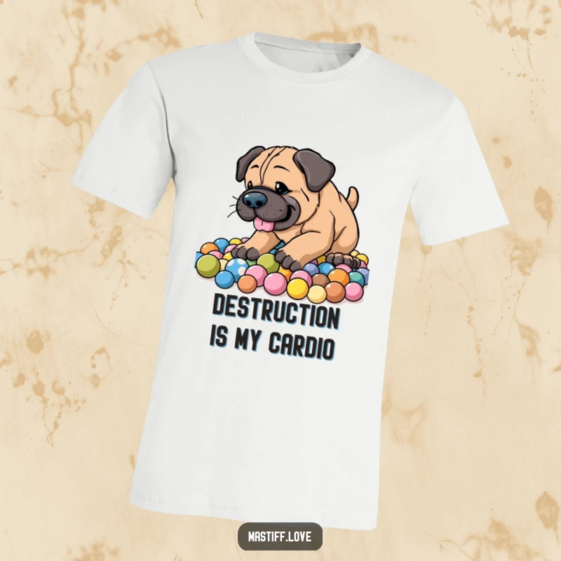 Funny Energetic Mastiff T-Shirt featuring an enthusiastic dog digging joyfully in a colorful pile of balls with a happy face.