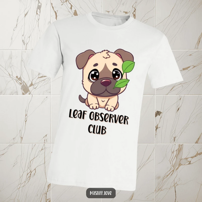 Funny t-shirt depicting a cute mastiff with large, wide eyes, attentively watching a leaf flutter in the breeze.