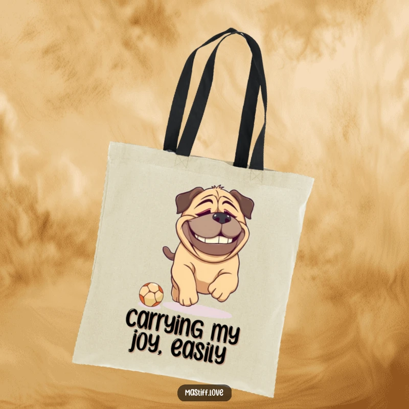 Funny Mastiff tote bag featuring a giant dog with a dopey grin, playfully engaging with a disproportionately tiny ball, perfect for dog lovers.