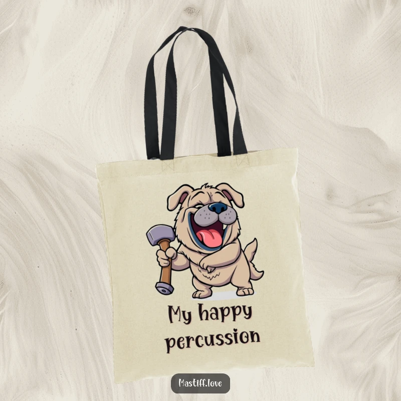 Funny Jovial Mastiff Tote Bag depicting a happy dog roaring with laughter while holding a giant squeaky hammer with a gleeful expression.